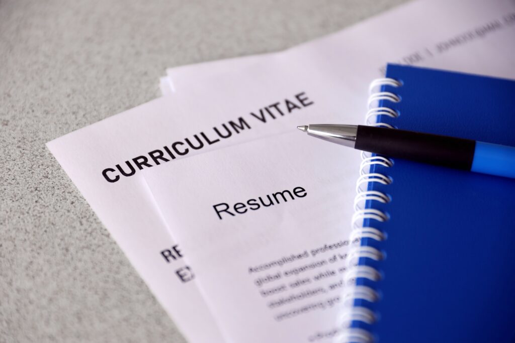 Top,View,Of,Stack,Of,Office,Documents,Including,Resume,And