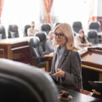 Attorney providing litigation risk management in court.